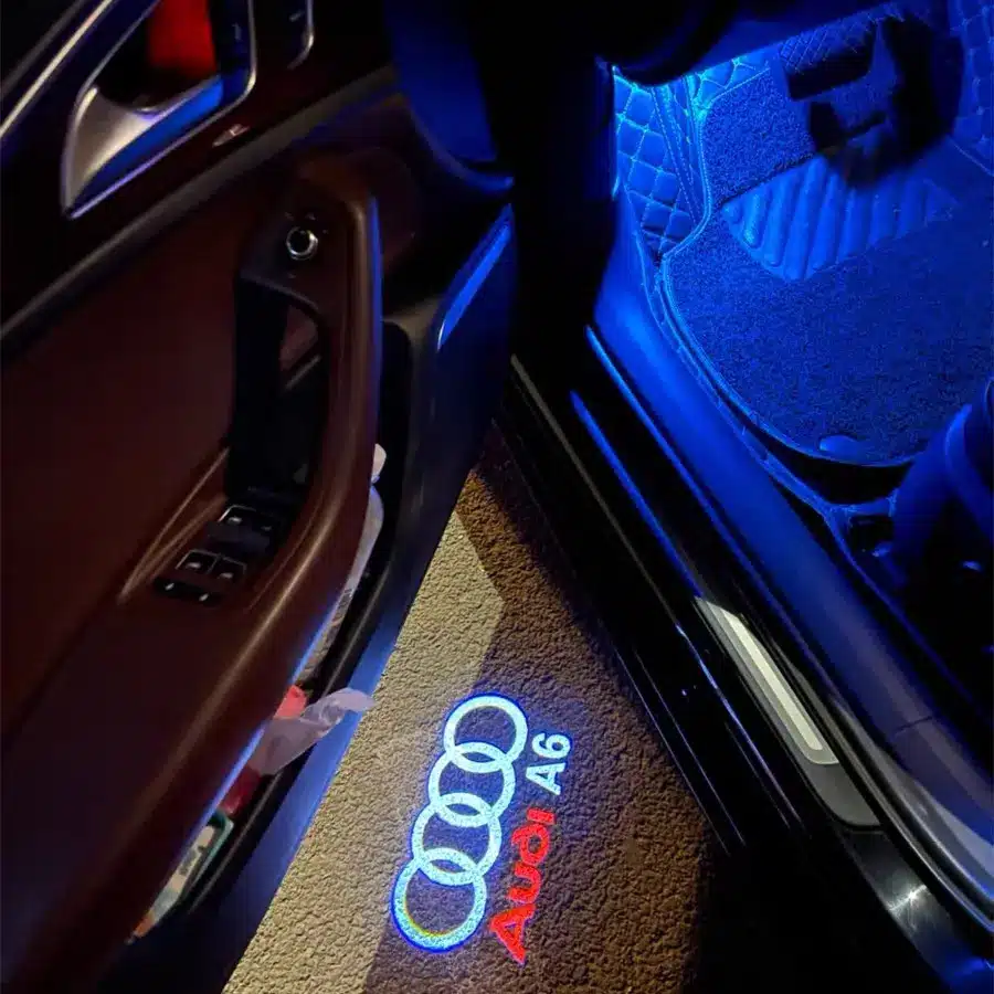 Audi A6 Puddle Lights Audi A6 puddle lights projecting logo onto ground as car door opens, premium upgrade for UK drivers