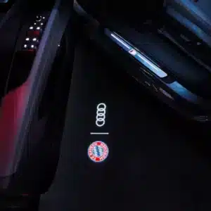 Audi door light projecting FC Bayern Munich badge on ground